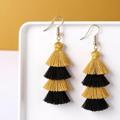 Step Up Your Style: Chic Black & Gold Tassel Earrings for Every Occasion!
