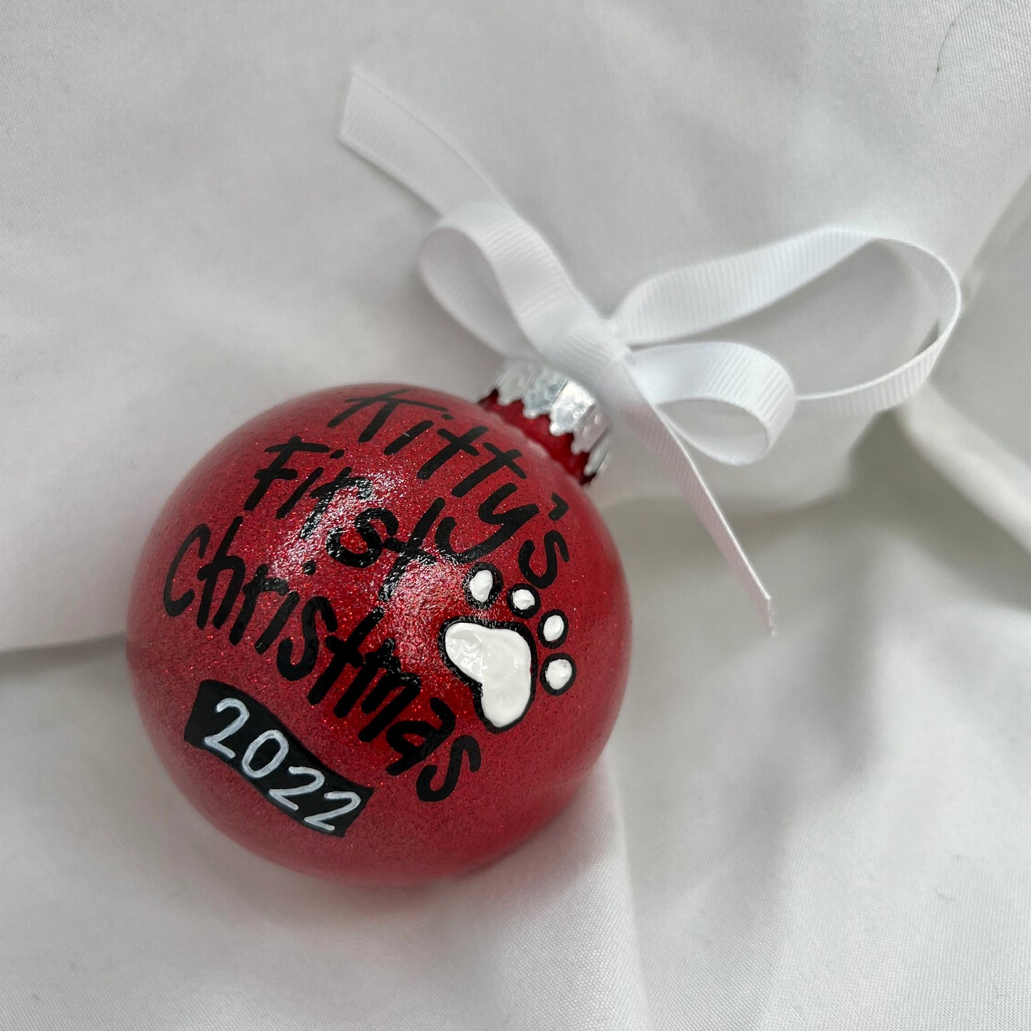 Pawsitively Adorable: Kitty's First Christmas Ornament!