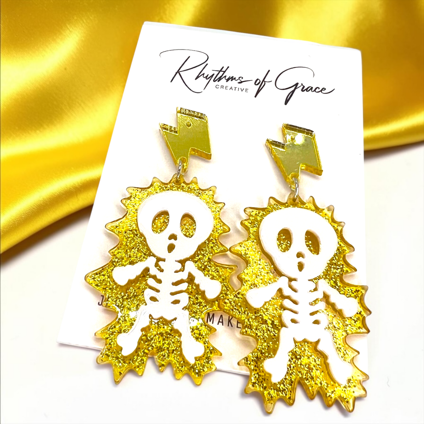 Electrify Your Look: Gold Electrocuted Skeleton Dangle Earrings for a Spook-tacular Style!