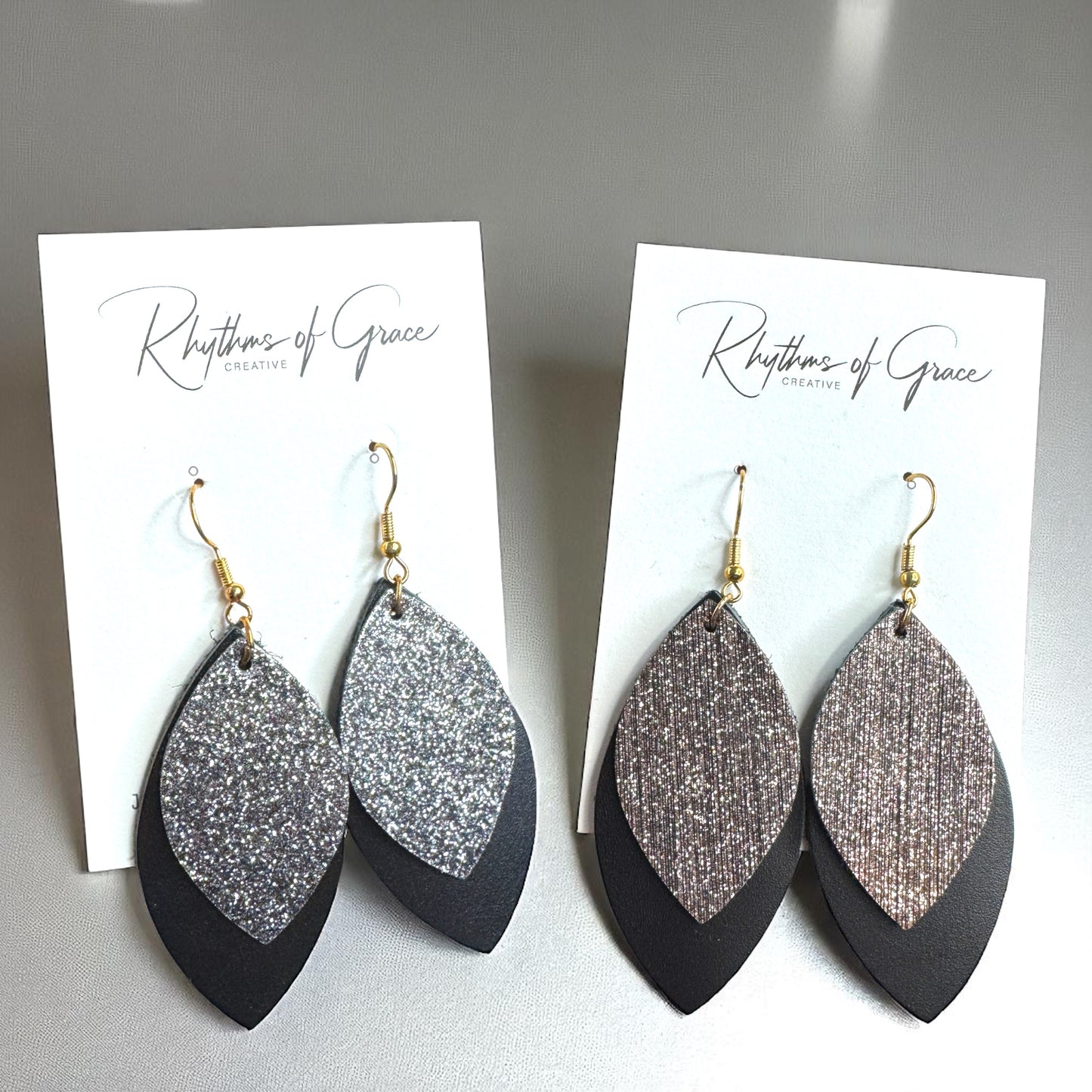 Spark Up Your Style: Chic Black Layered Leather Earrings - Gold or Silver Accent!