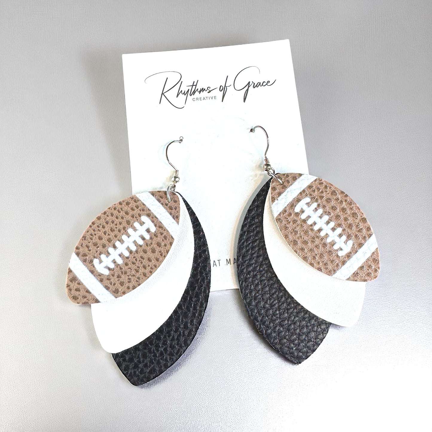 Game Day Glam: Black and White Football Earrings for the Ultimate Fan!