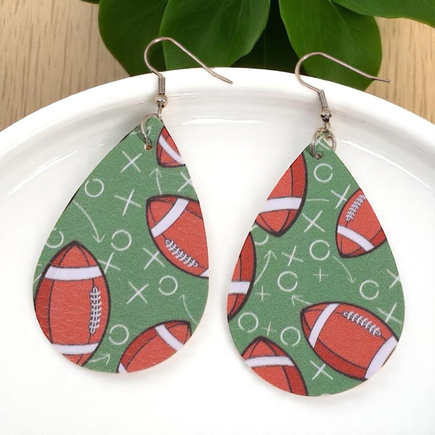 Touchdown Style: Football Playbook Dangle Earrings 🏈