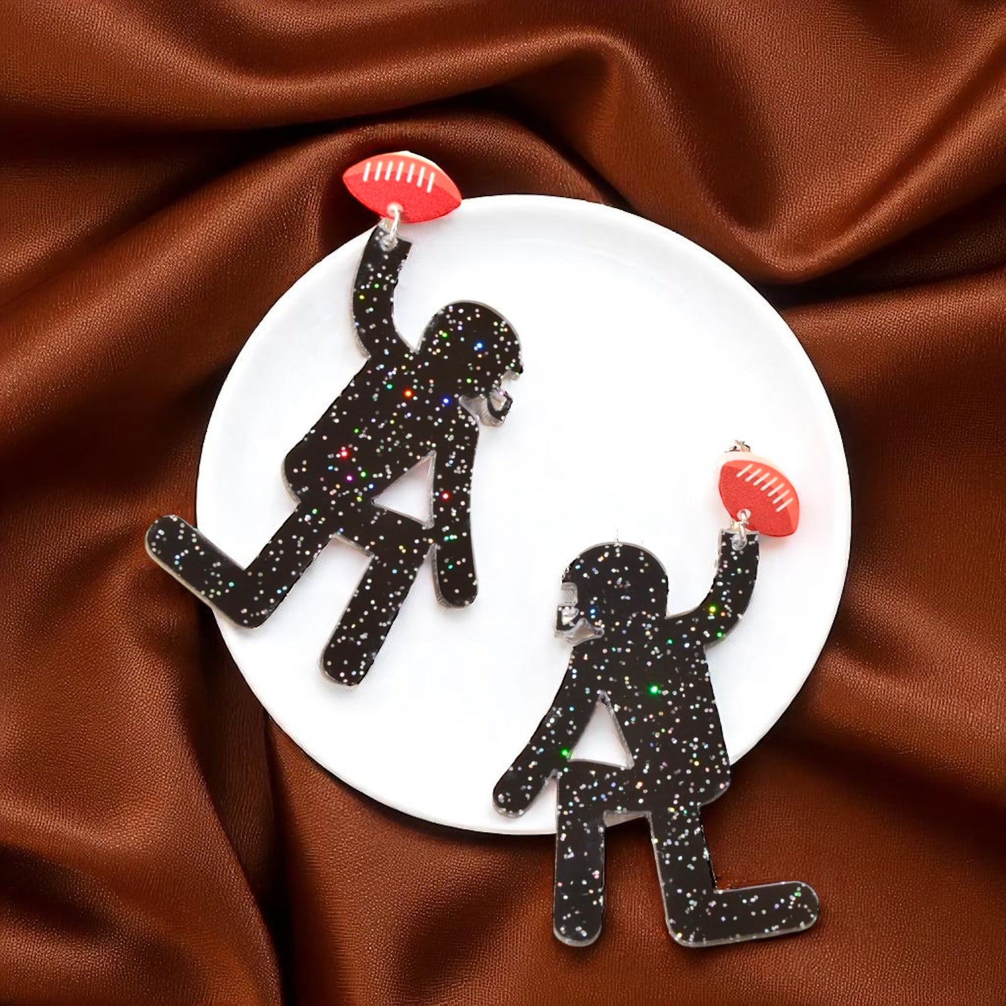 Touchdown Style: Football Player Dangle Earrings 🏈