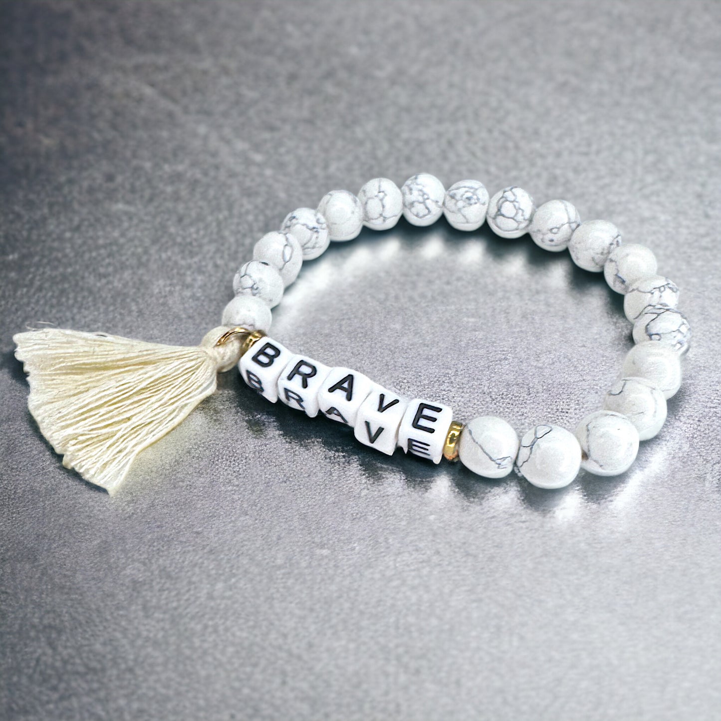 Tassel Charm “Brave” Beaded Bracelet – Your New Favorite Accessory!