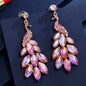 Radiant Peacock Glam Earrings – Feather Your Style with Sparkle!