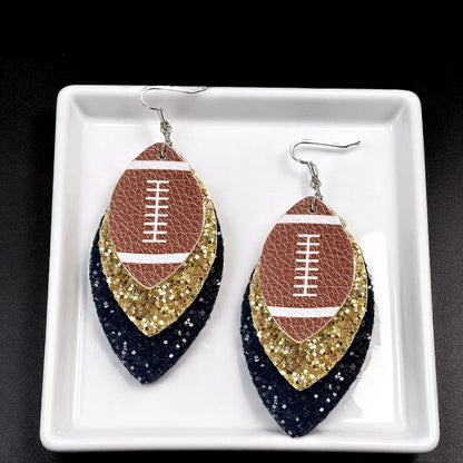 Game Day Glam: Black and Gold Glitter Football Earrings for the Ultimate Fan!
