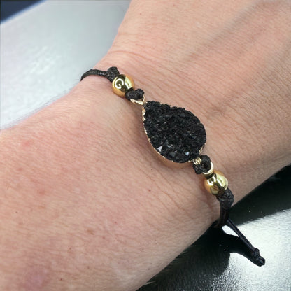 Black Leather Bracelet with Gold and Black Charm