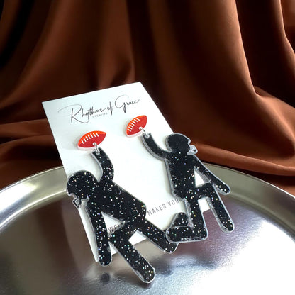 Touchdown Style: Football Player Dangle Earrings 🏈