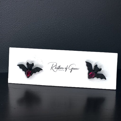 Bat-tastic Bling: Red & Black Rhinestone Stud Earrings!