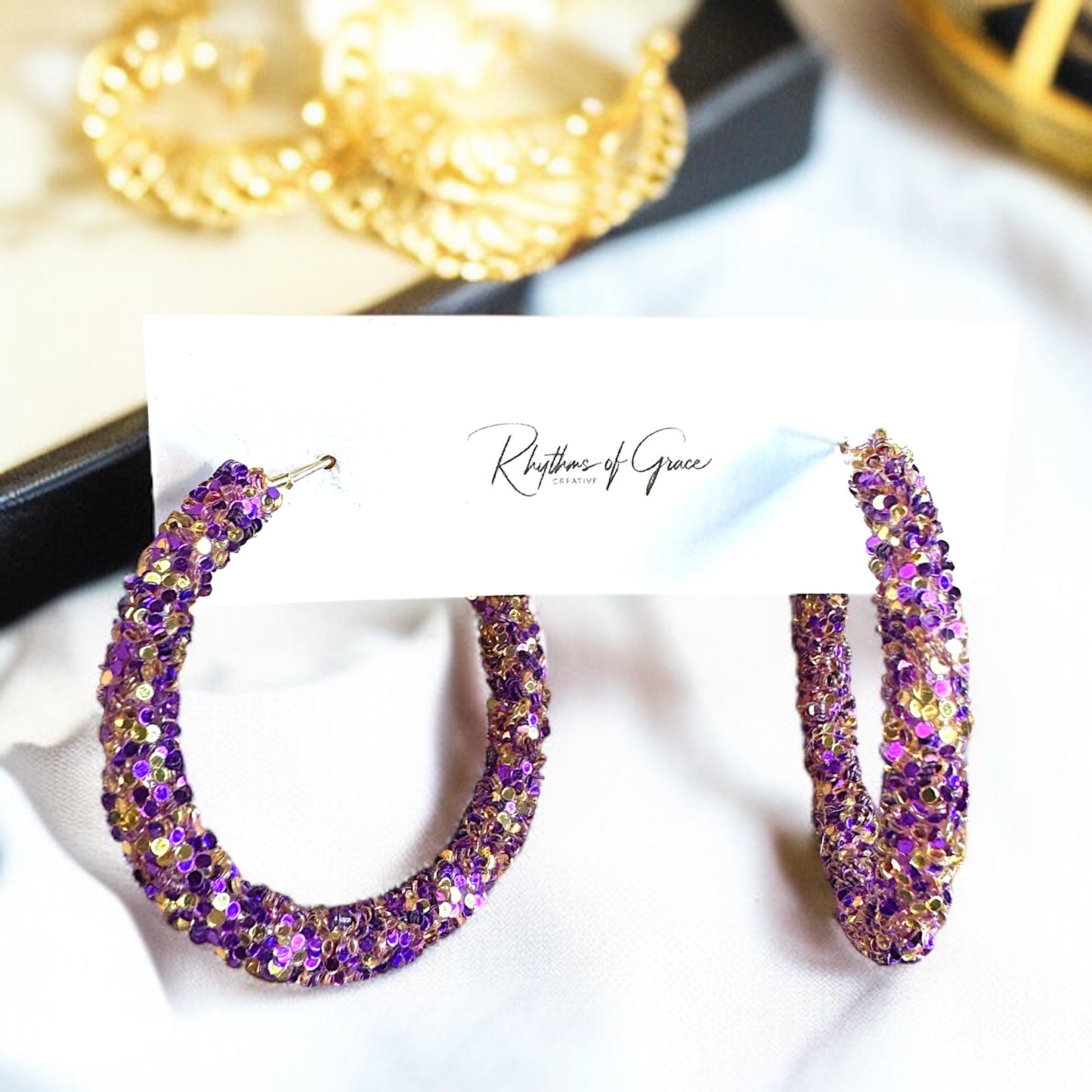 Shimmering Elegance: Purple and Gold Glitter Hoops