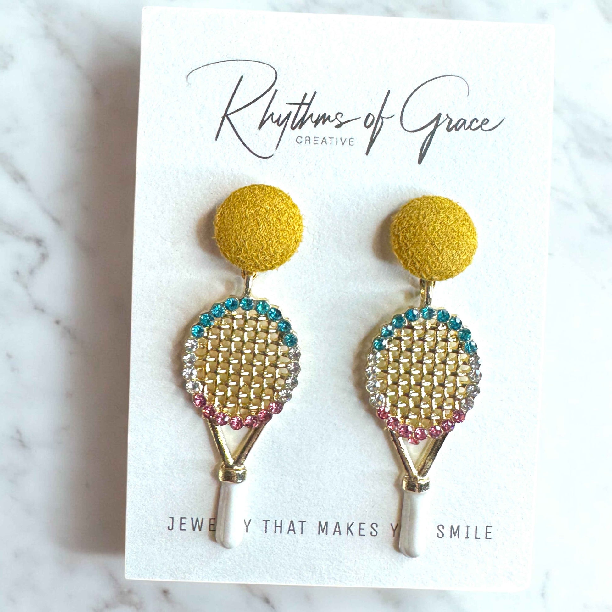 Sparkle on the Court with Our Rhinestone Tennis Racket Dangle Earrings! 🎾