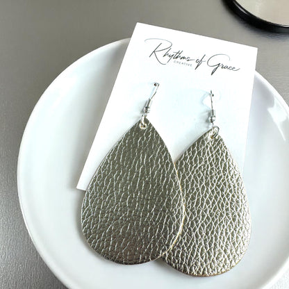 Sparkle & Shine: Metallic Teardrop Faux Leather Earrings! 🌟