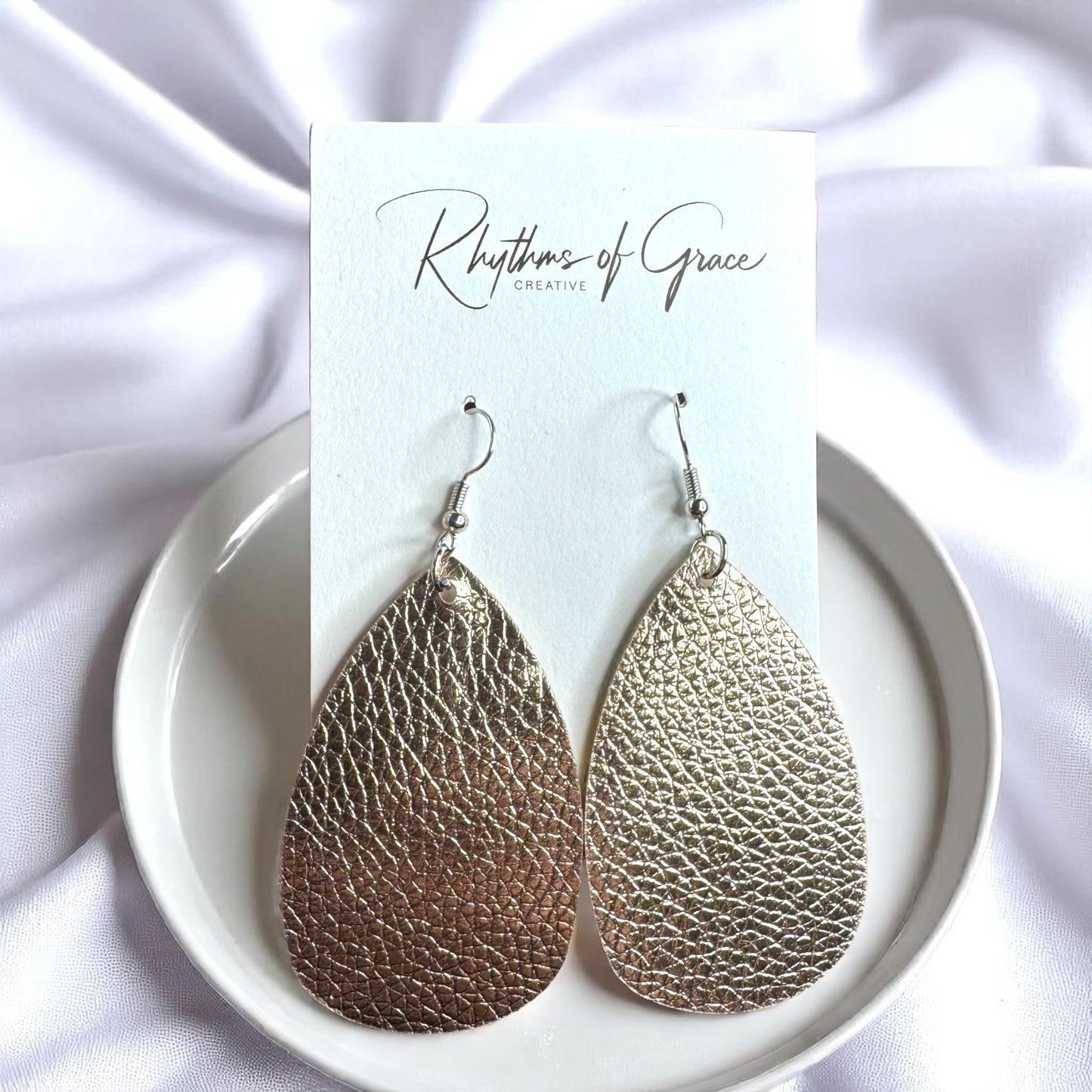Sparkle & Shine: Metallic Teardrop Faux Leather Earrings! 🌟