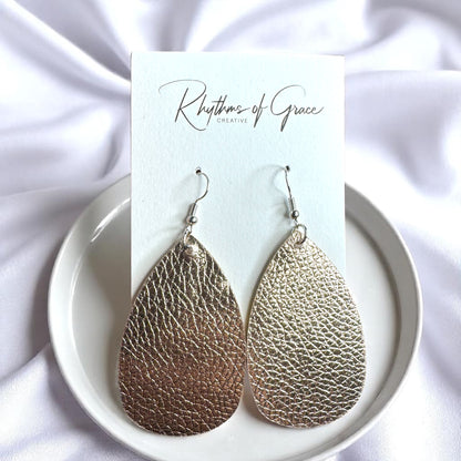 Sparkle & Shine: Metallic Teardrop Faux Leather Earrings! 🌟