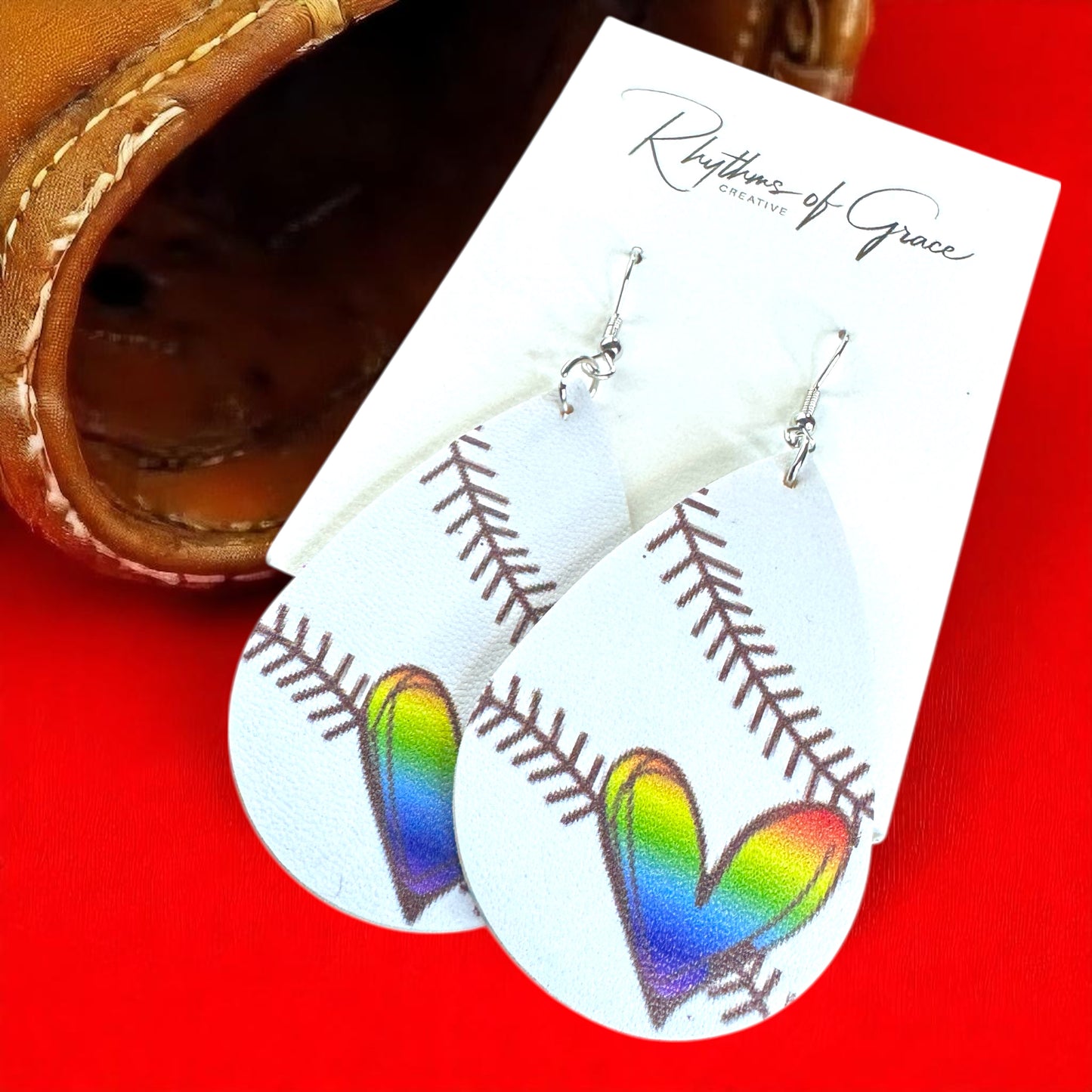 Swing into Style with Our Rainbow Heart Baseball Dangle Earrings! ⚾️🏳️‍🌈