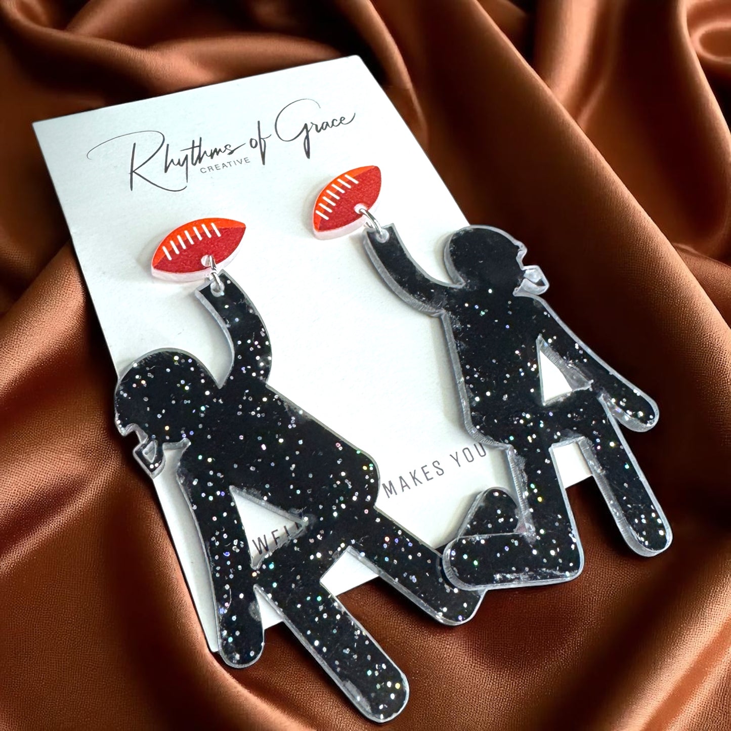 Touchdown Style: Football Player Dangle Earrings 🏈