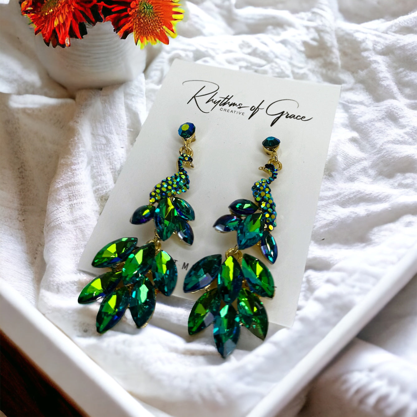 Radiant Peacock Glam Earrings – Feather Your Style with Sparkle!