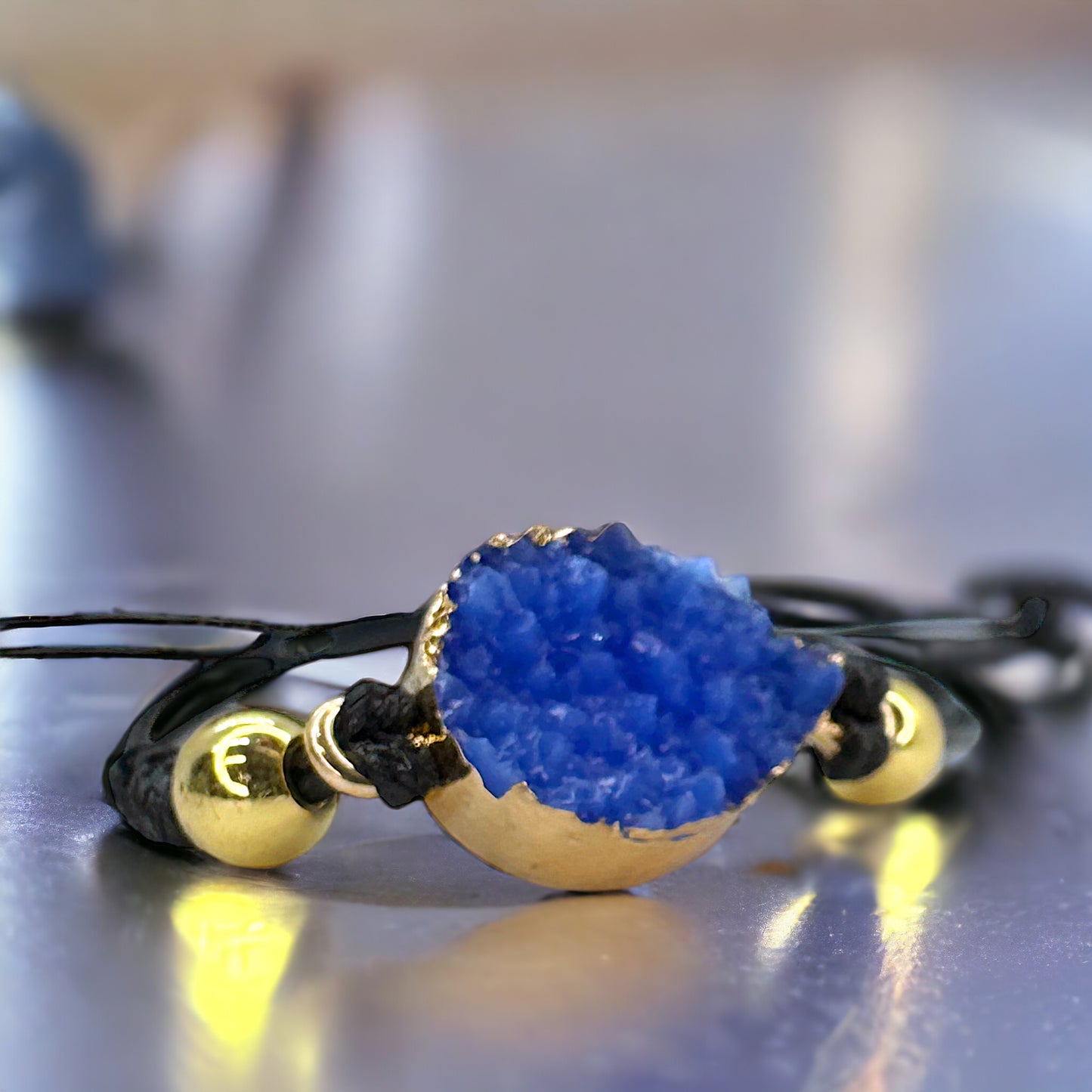 Black Leather Bracelet with Gold and Blue Charm