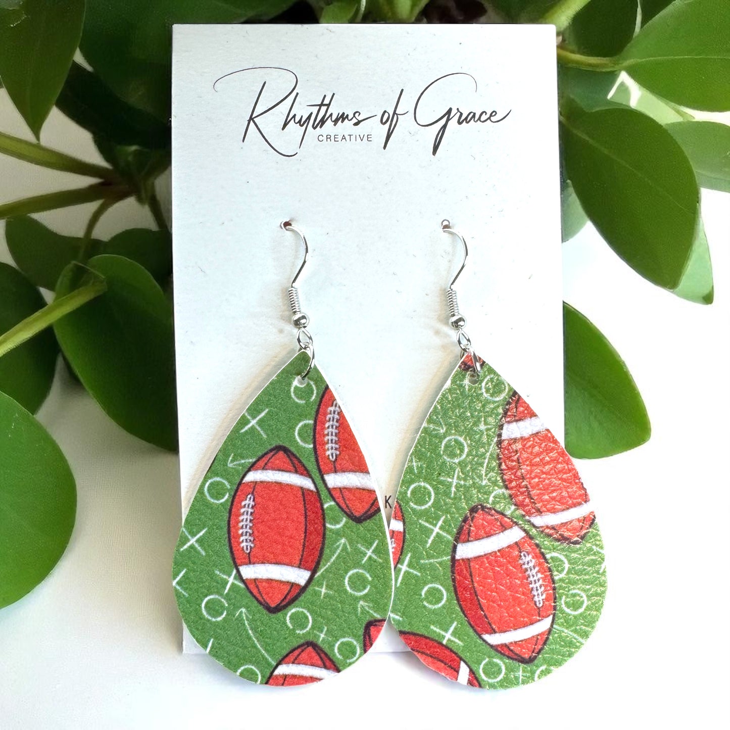 Touchdown Style: Football Playbook Dangle Earrings 🏈