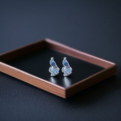 Peacock Pizzazz: Dazzling Studs for Every Style! 🦚