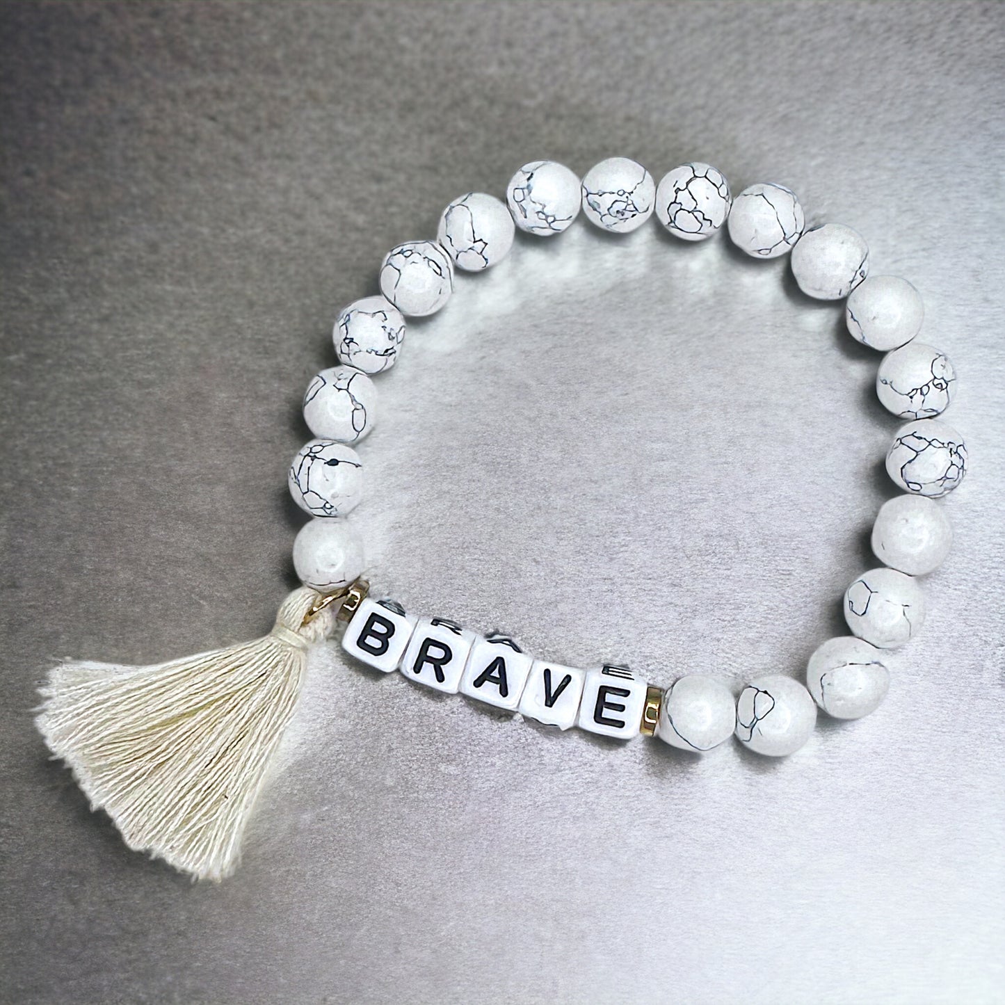 Tassel Charm “Brave” Beaded Bracelet – Your New Favorite Accessory!