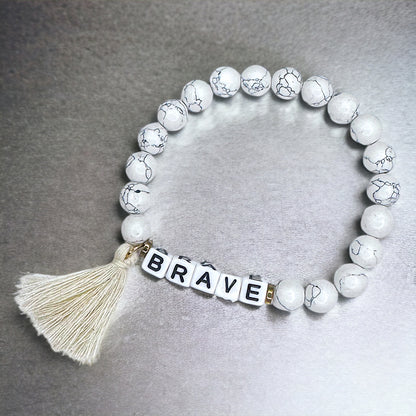 Tassel Charm “Brave” Beaded Bracelet – Your New Favorite Accessory!