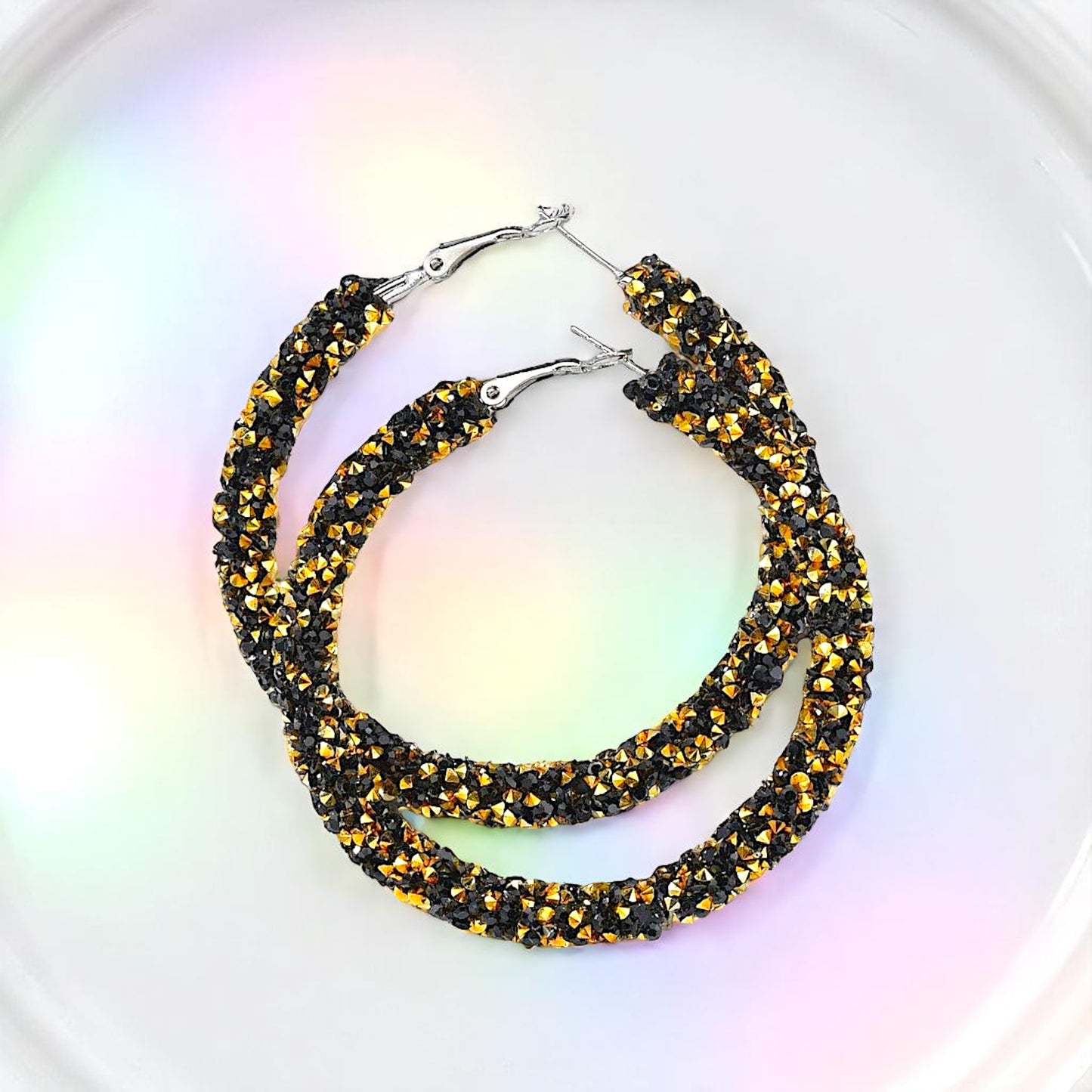 Shimmering Elegance: Black and Gold Glitter Hoops