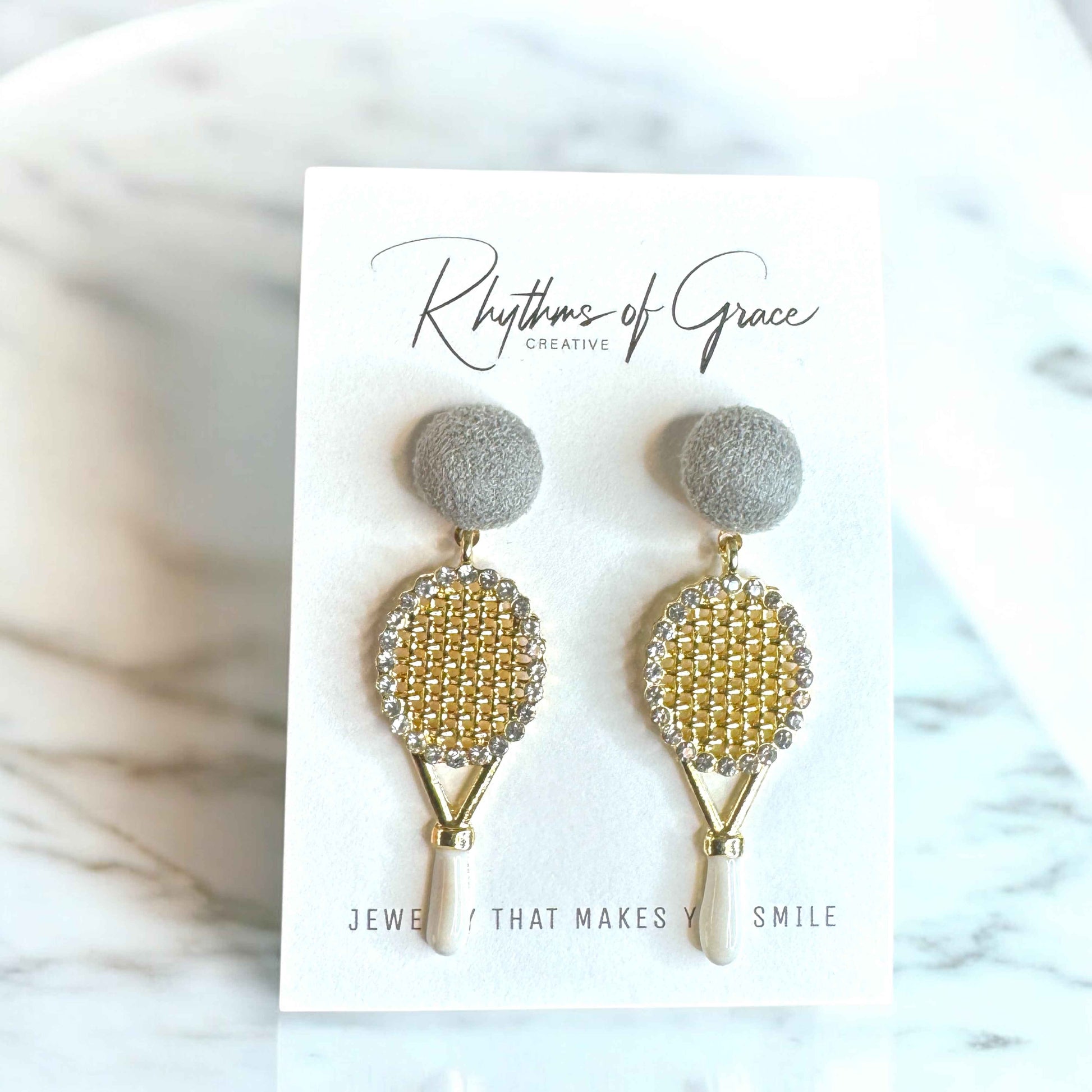 Sparkle on the Court with Our Rhinestone Tennis Racket Dangle Earrings! 🎾