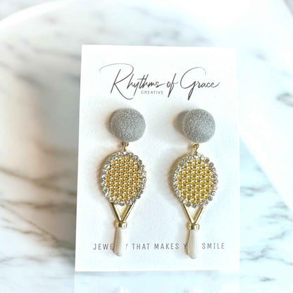 Sparkle on the Court with Our Rhinestone Tennis Racket Dangle Earrings! 🎾