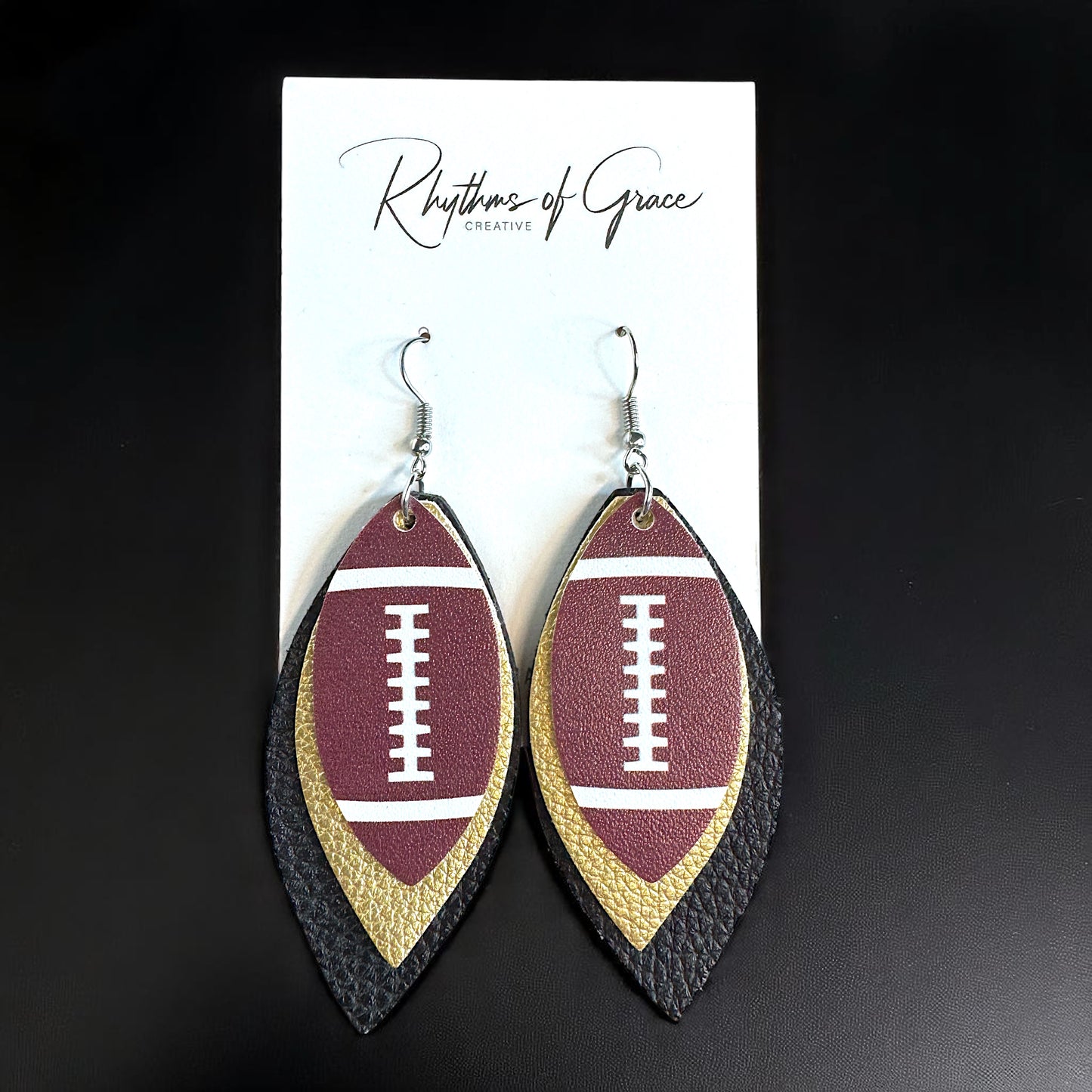 Touchdown in Style: Black and Gold Football Earrings for the Fashion-Forward Fan!