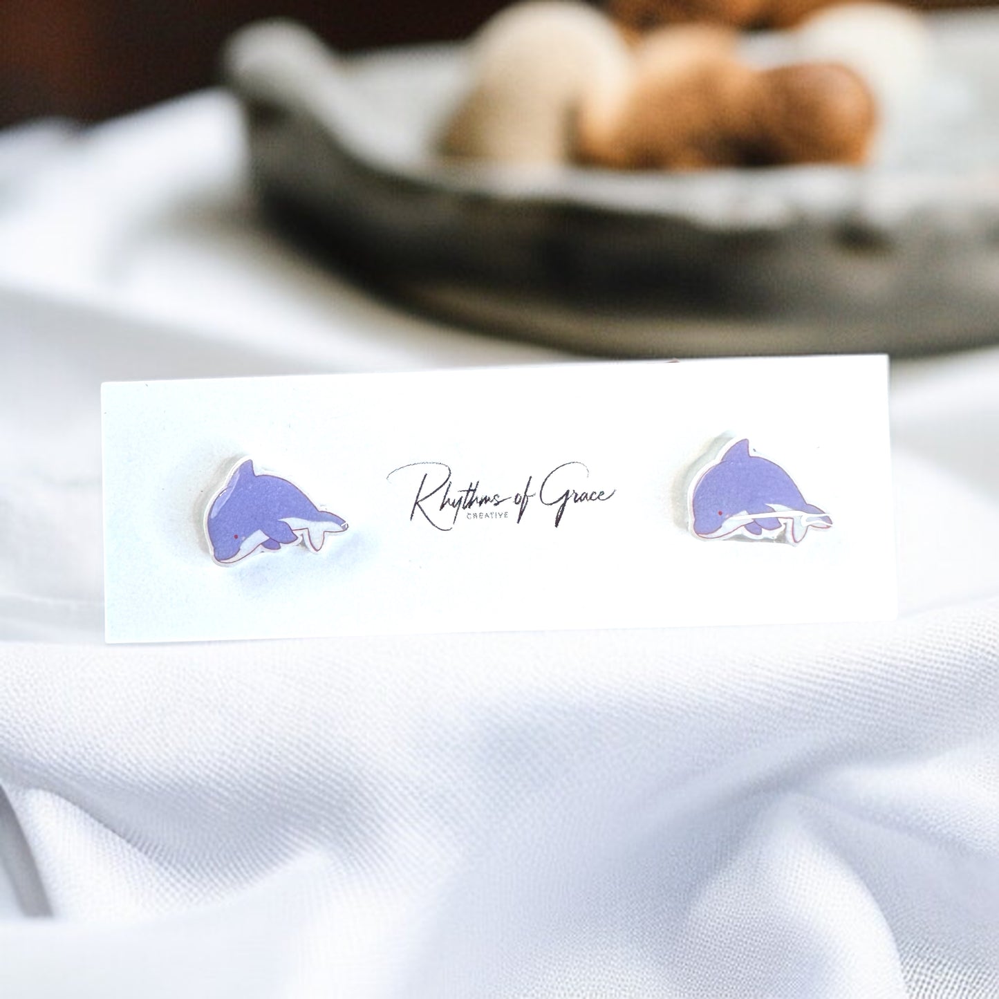 Make a Splash with Purple Dolphin Stud Earrings!