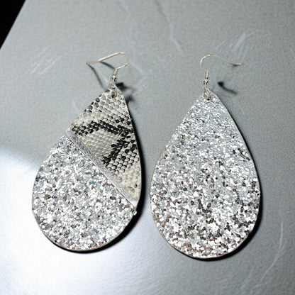 Slither in Style with Our Snake Print Teardrop Dangle Earrings! 🐍