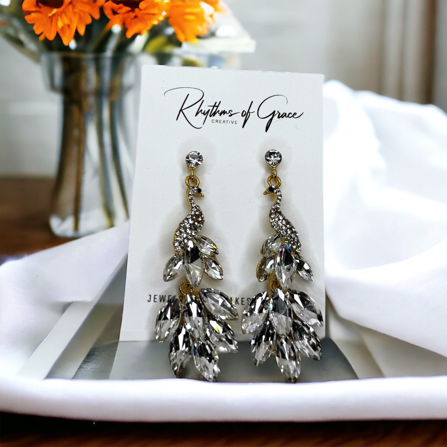 Radiant Peacock Glam Earrings – Feather Your Style with Sparkle!