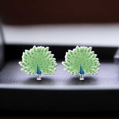 Peacock Pizzazz: Dazzling Studs for Every Style! 🦚