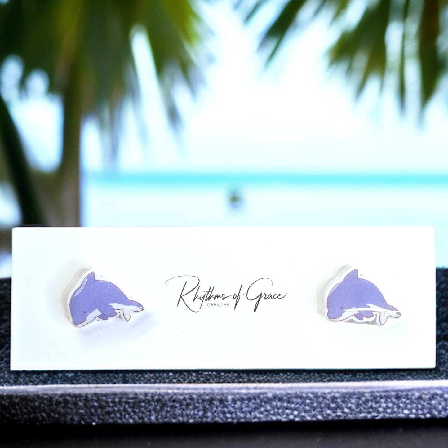 Make a Splash with Purple Dolphin Stud Earrings!