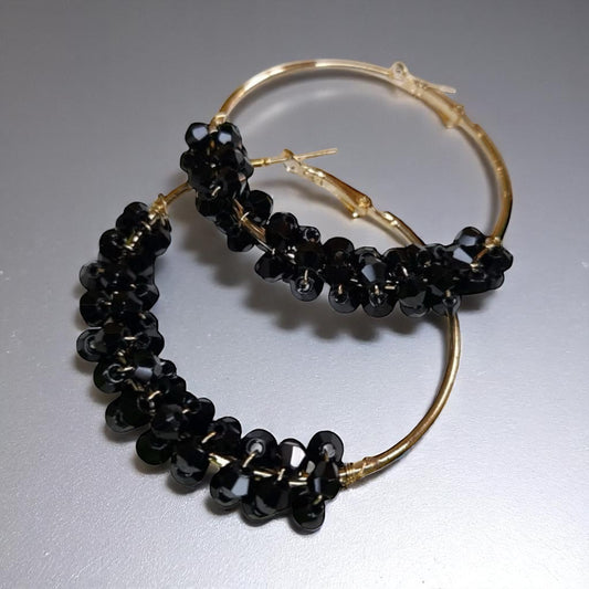 Chic Elegance: Black & Gold Beaded Hoop Earrings