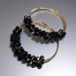 Chic Elegance: Black & Gold Beaded Hoop Earrings
