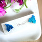 Sparkle Like a Princess: Glitter Cinderella Castle Earrings for Your Royal Ears!