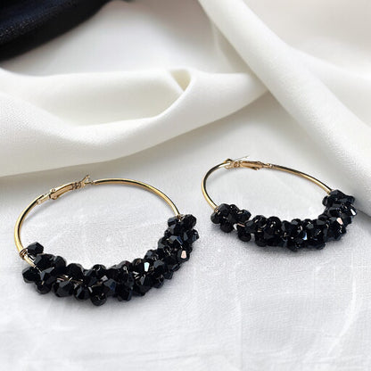 Chic Elegance: Black & Gold Beaded Hoop Earrings
