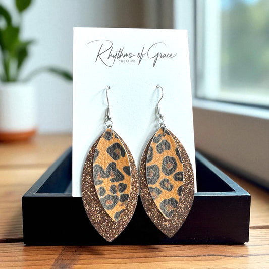 Wild & Glam – Brown Glitter + Animal Print Dangle Earrings