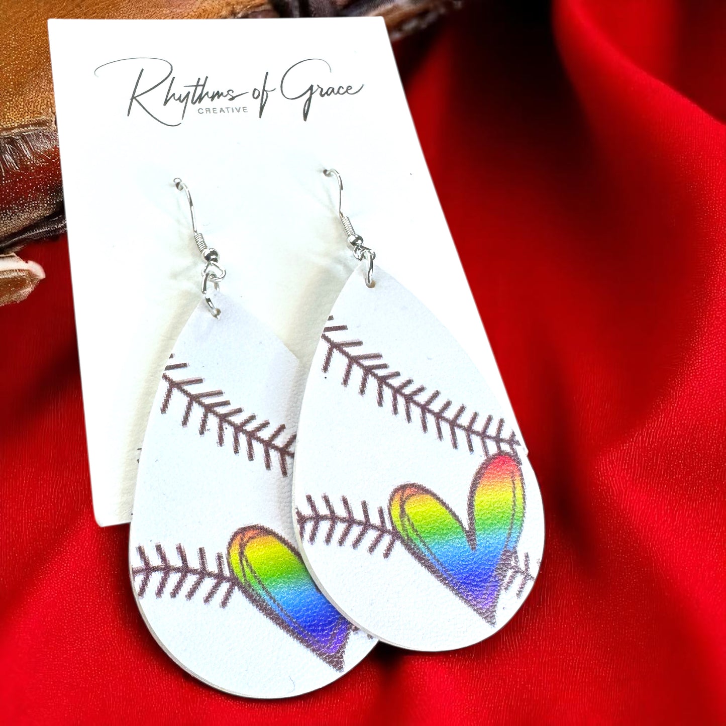 Swing into Style with Our Rainbow Heart Baseball Dangle Earrings! ⚾️🏳️‍🌈
