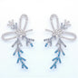 Sparkling Frozen Bow Earrings – Embrace Holiday Glamour!