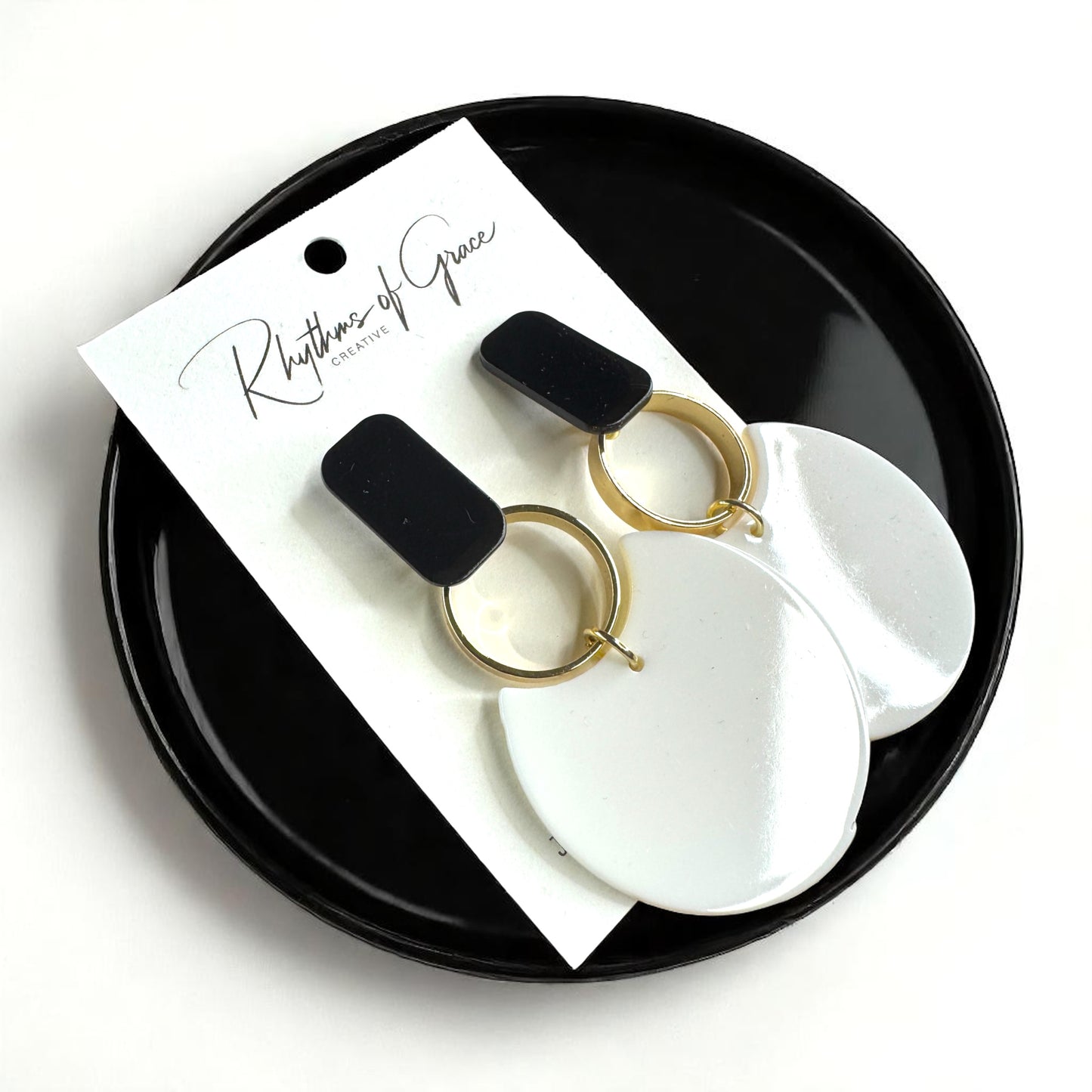 Chic & Cheerful: Black & White Dangle Earrings