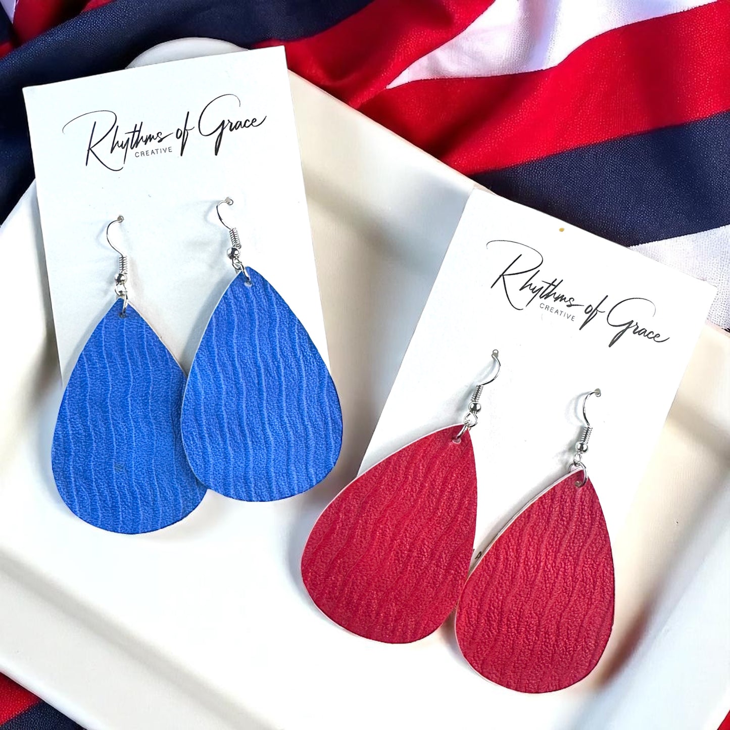Teardrop Treasures: Red & Blue Faux Leather Dangle Earrings for Ultimate Style!