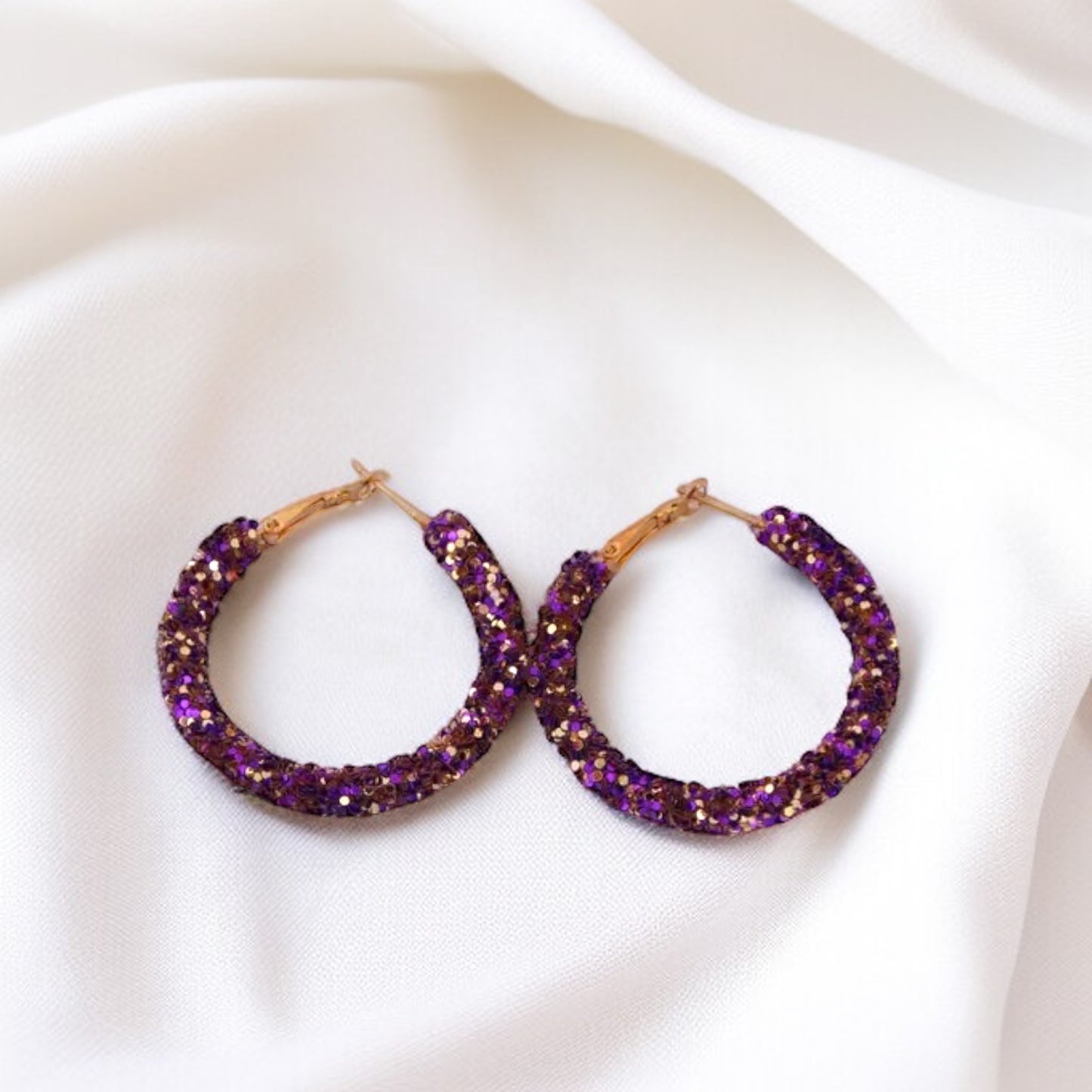 Shimmering Elegance: Purple and Gold Glitter Hoops