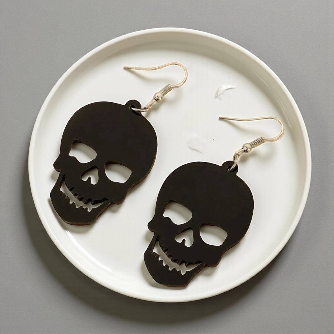 Spooky Chic: Black Skull Dangle Earrings for the Bold at Heart!