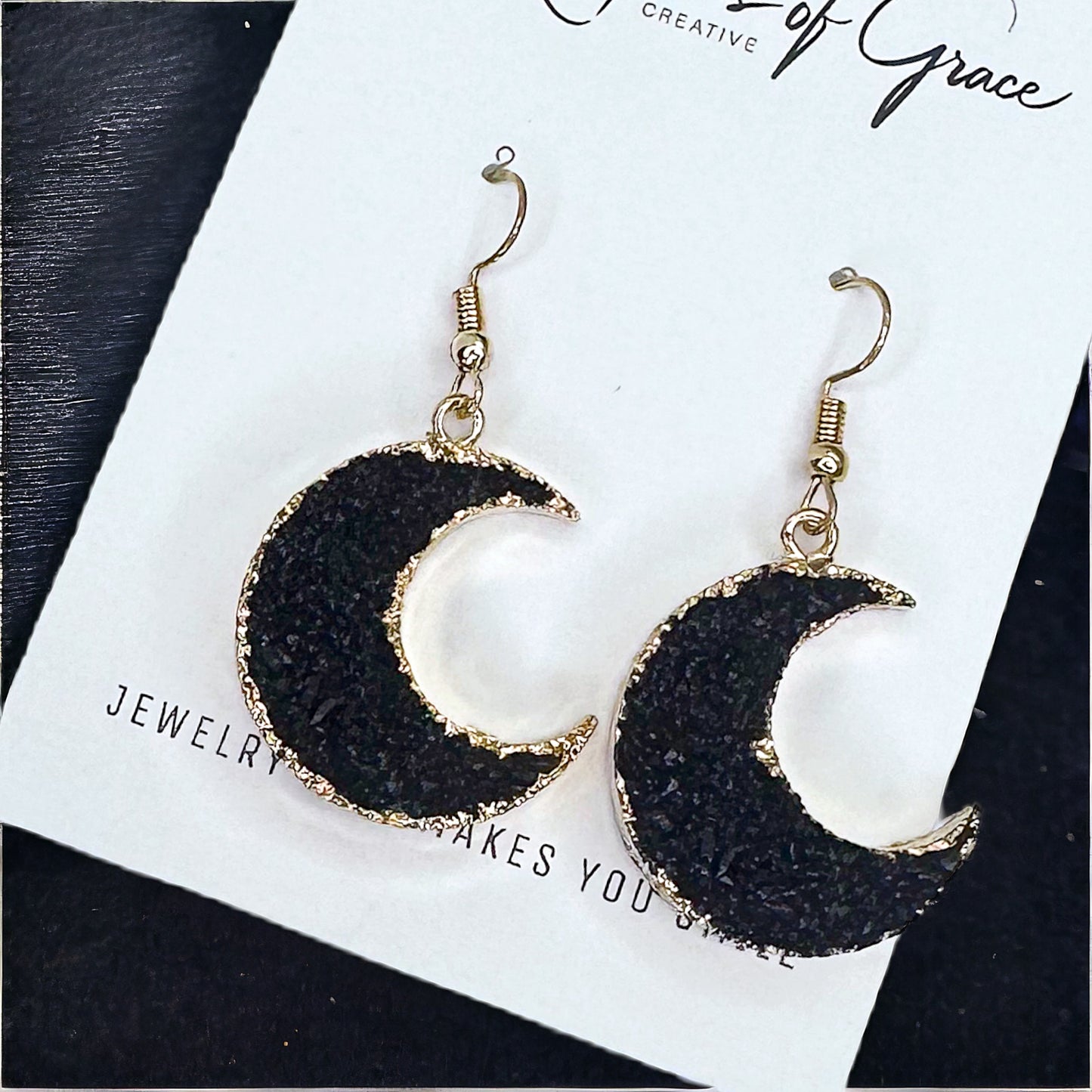 Shimmering Nights: Black Stone Earrings with Golden Glam!