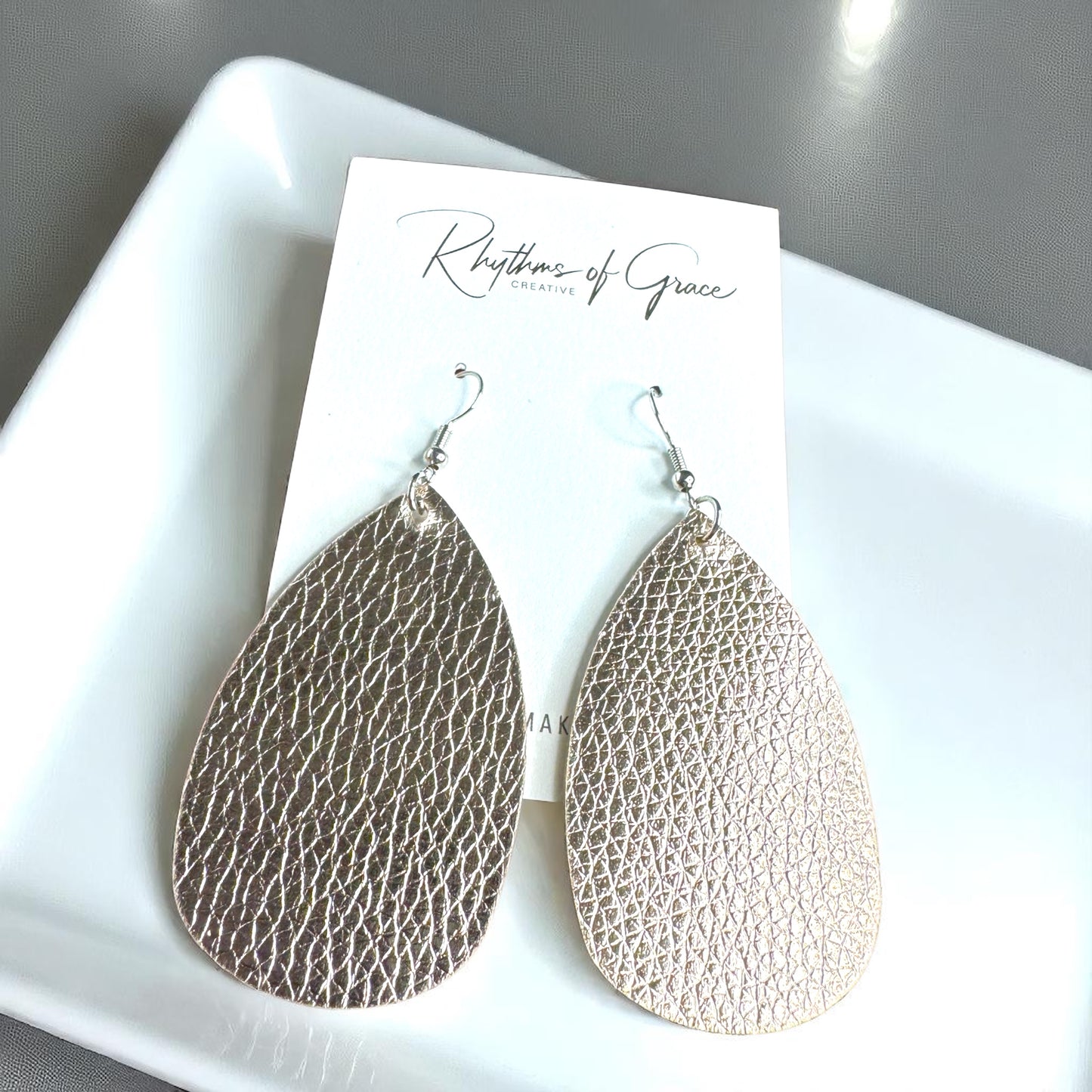 Sparkle & Shine: Metallic Teardrop Faux Leather Earrings! 🌟