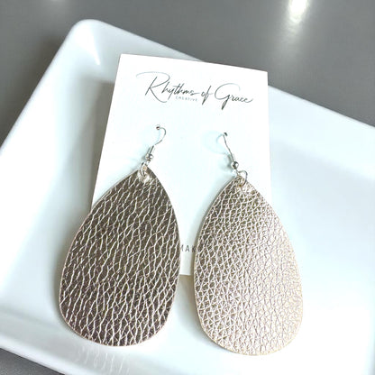 Sparkle & Shine: Metallic Teardrop Faux Leather Earrings! 🌟