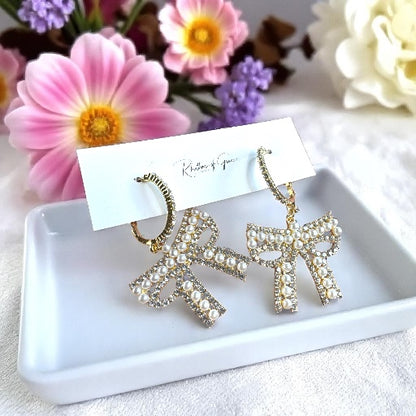 Sparkle & Shine: Rhinestone & Faux Pearl Bow Hoop Earrings